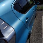 Rear quarter panel and tail light of the Toyota Aqua